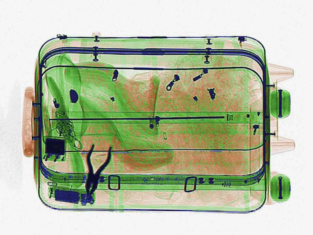 Как выглядит ваш чемодан на рентгене в аэропорту и как ищут запрещенные предметы